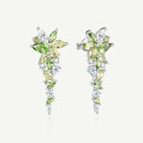 „Wisteria Whisper“ Flower Bar Peridot Silberohrringe