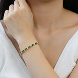 FANCIME „Glamour Radiance“ Armband aus Sterlingsilber mit Geburtsstein Mai, Tennis-Smaragd im Fantasieschliff 