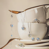 Trinity Textured Silver Earrings in Created Aquamarine