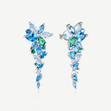 „Wisteria Whisper“ Flower Bar Ohrringe mit blauem Topas und Silber