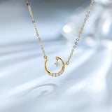 „Lunar Dream“ Halskette aus 14-karätigem Gelbgold mit Mondmotiv und im Labor gezüchtetem Diamanten (0,076 ct).