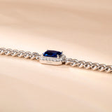 FANCIME „Axis“ Armband mit strahlend geschliffenem Saphir als Geburtsstein, Sterlingsilber und kubanischer Gliederkette