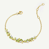 „Wisteria Whisper“ Flower Bar Peridot Silberarmband