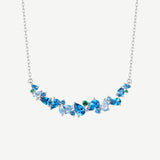 „Wisteria Whisper“ Flower Bar Halskette mit blauem Topas und Silber