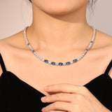 „Glamour Radiance“ – Tennis-Halskette aus Sterlingsilber mit Geburtsstein Dezember, ausgefallen geschliffenem blauem Topas und Geburtsstein Dezember