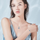 Armband aus Sterlingsilber mit dem Geburtsstein „Unendliche Umarmung“ (Dezember) – Londoner Topas, Unendlichkeitssymbol
