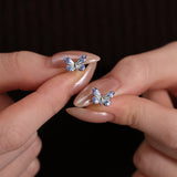 FANCIME „Starlight Butterfly“ Ohrringe aus leuchtendem Emaille und Sterlingsilber