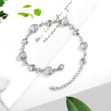 FANCIME Halo Herz Juni Geburtsstein Mondstein Station Tennis Sterling Silber Armband