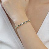 Armband „Glamour Radiance“ mit Geburtsstein Dezember, ausgefallen geschliffenem Tennis-Blautopas, Sterlingsilber 