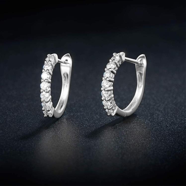 White gold huggie earrings with stones in 14k gold