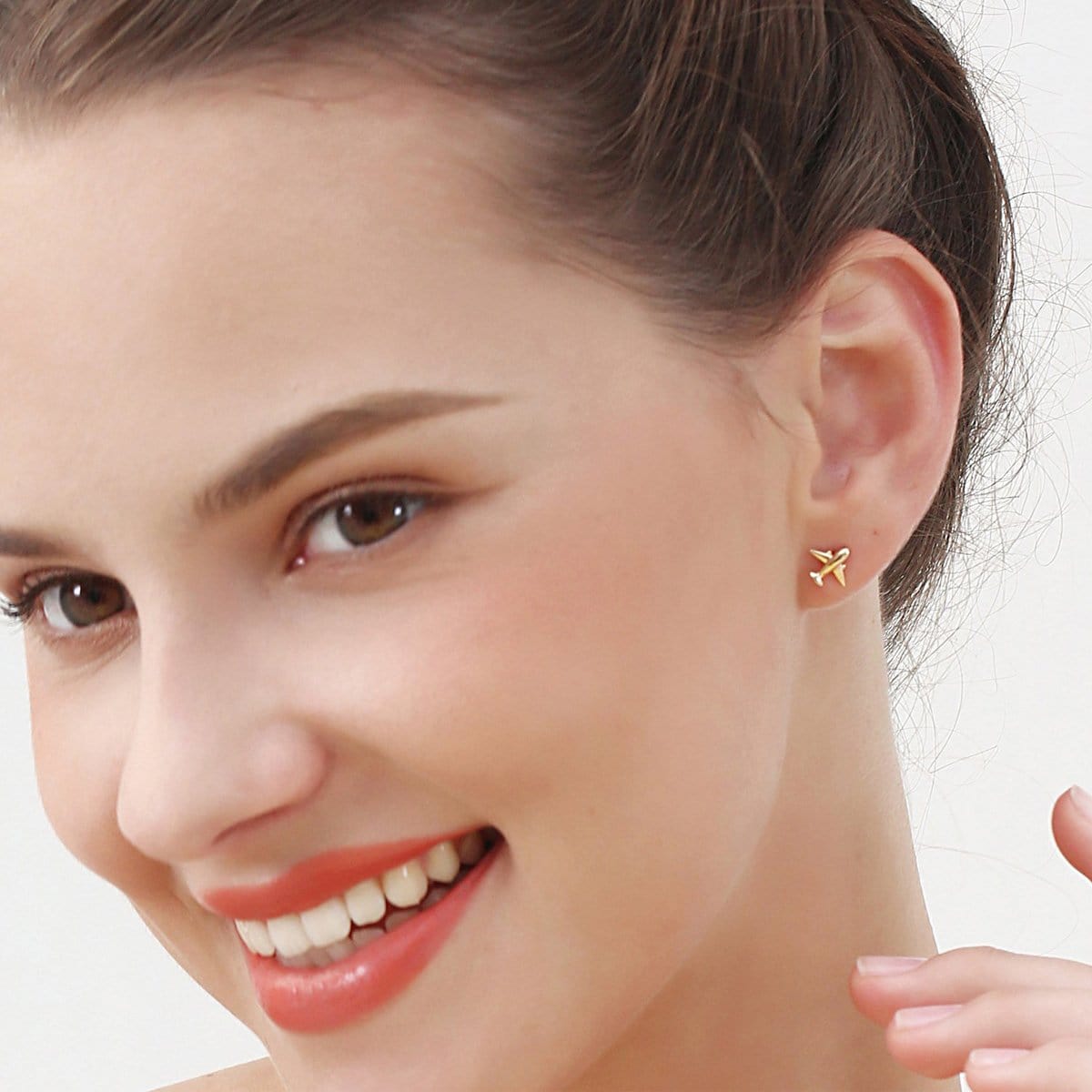 Airplane jewelry in 18k yellow gold